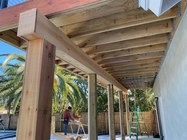 Cedar beam and rafter connection under a patio cover