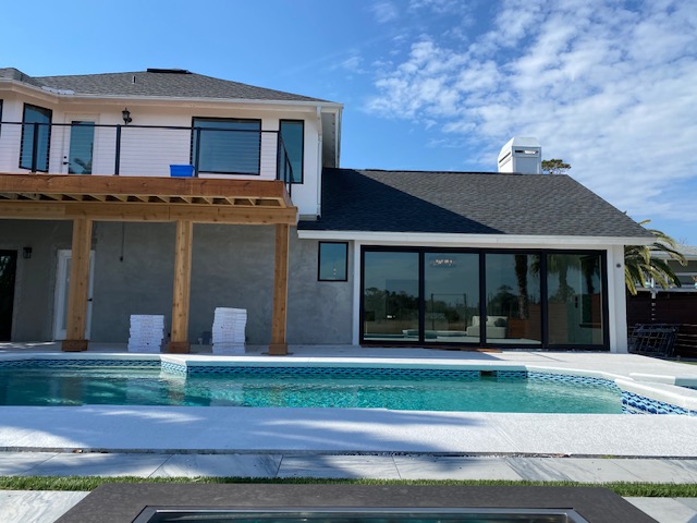 Pool house cover and glass wall