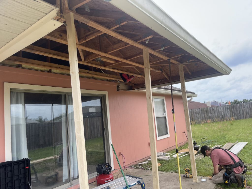 Patio roof reframed over a rear elevation