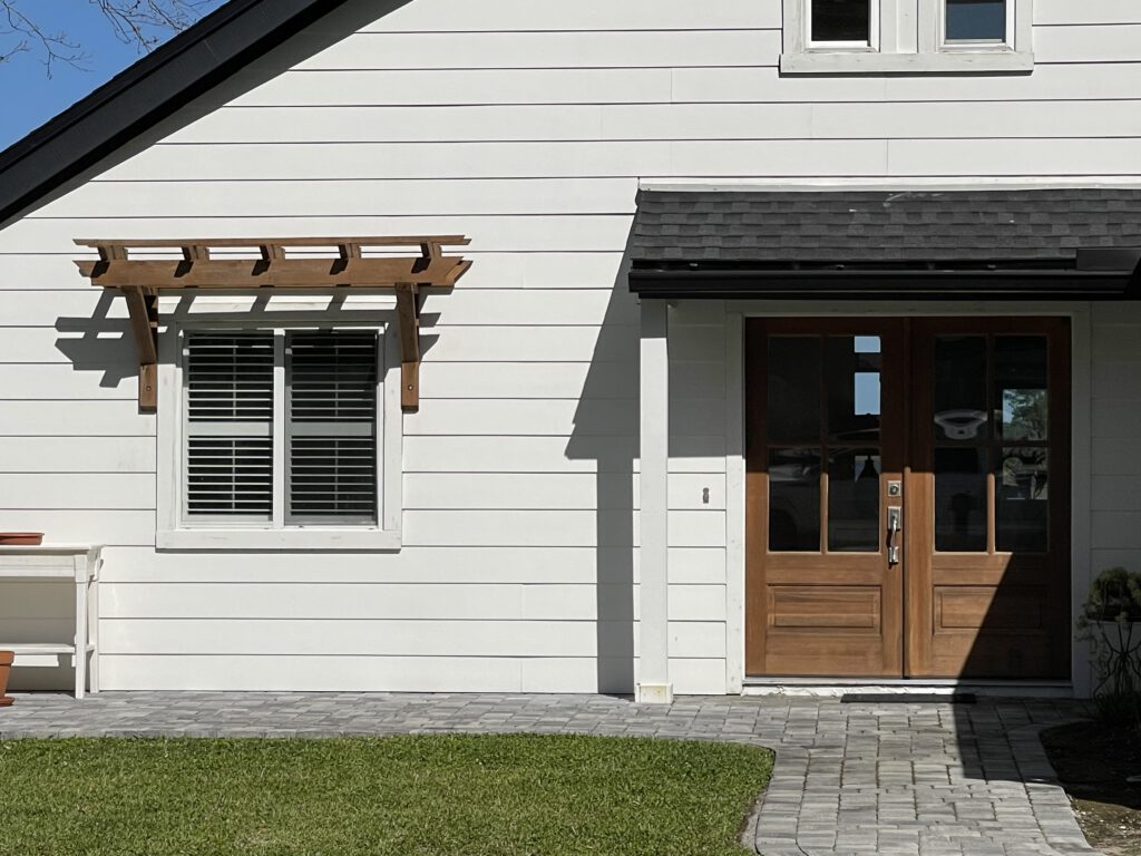 Entry pergola and timber doors