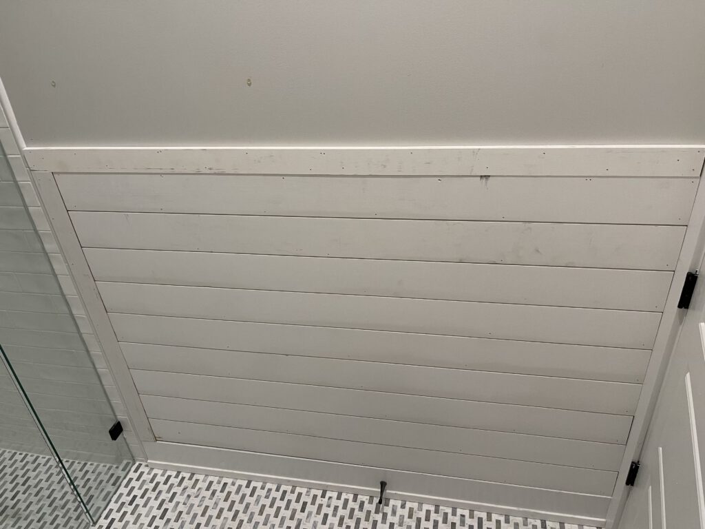 Slat privacy screen beside a deck
