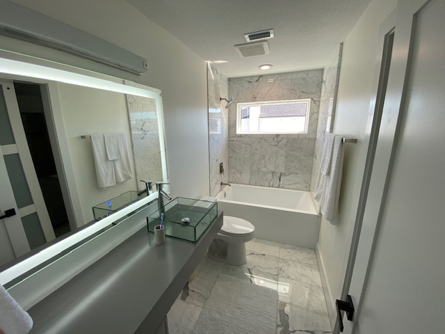 Guest bath, marble and glass